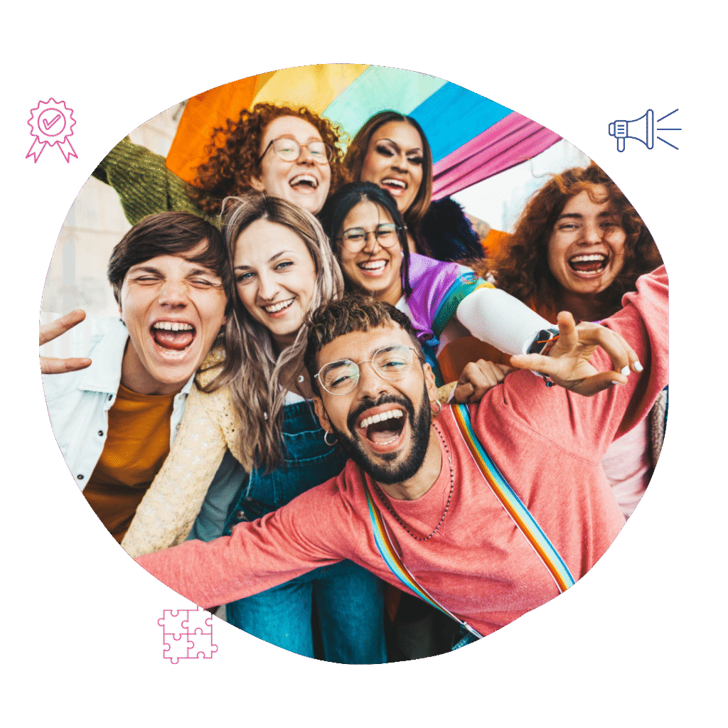 A group of young adults laugh joyfully, with a rainbow flag in the background, showcasing Your Best Life Behaviour Support
